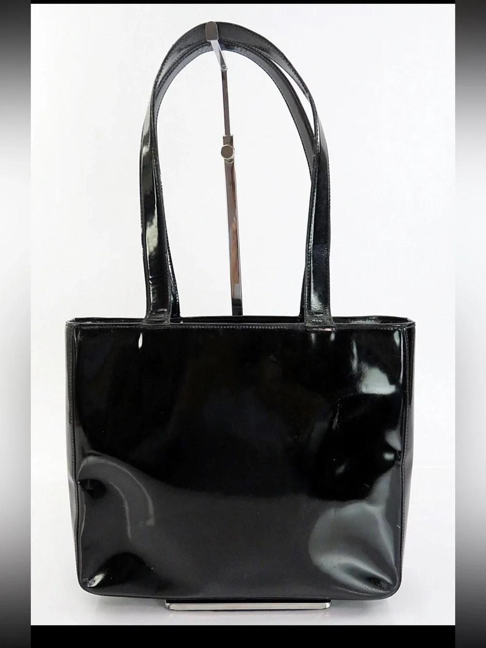 CHANEL Black Patent Tote with Embossed Logo